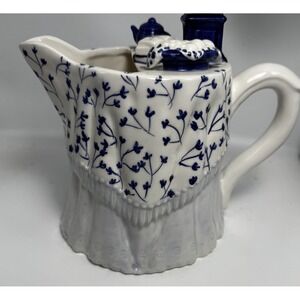 Vintage Ornate Ceramic blue and white pitcher 2 small chips